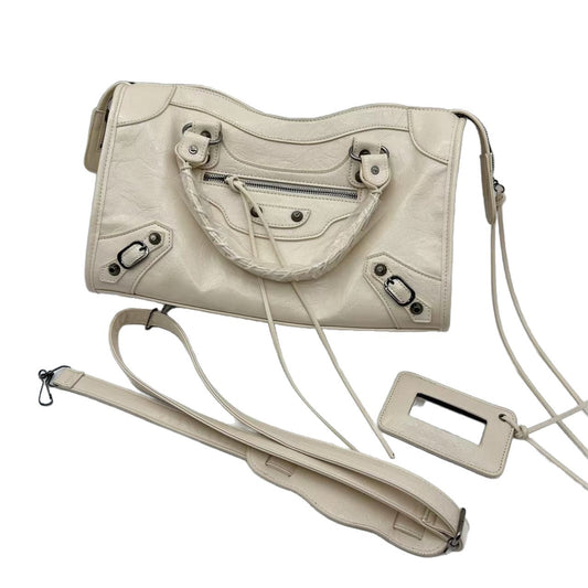 Large capacity AriaLuxe studded biker shoulder bag in cream with braided handles, detachable strap, and matching cardholder.
