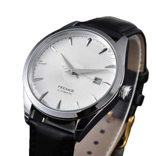 Silver dial mechanical automatic men's watch with a black leather strap and date display at 3 o'clock.