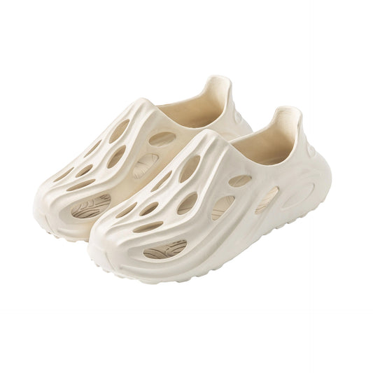 Soleil Breathable Clog in off-white with thick sole, featuring multiple ventilation holes for comfort and breathability.