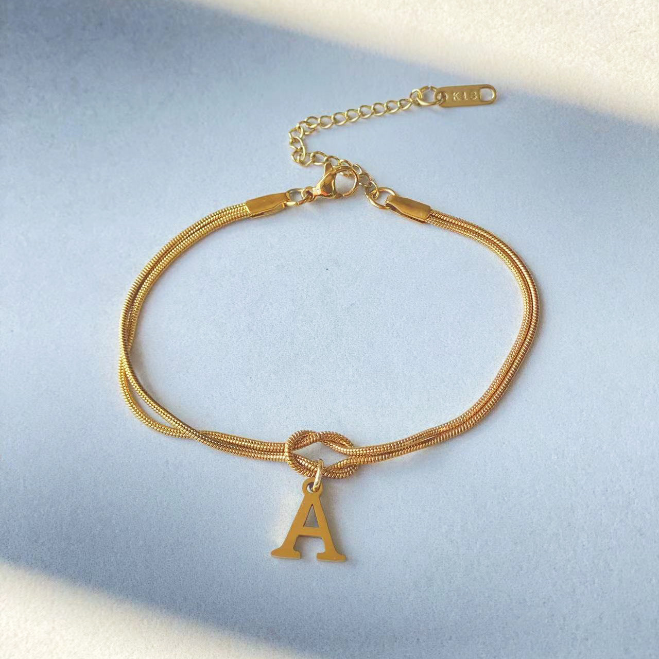 Initial Love Knot Bracelet