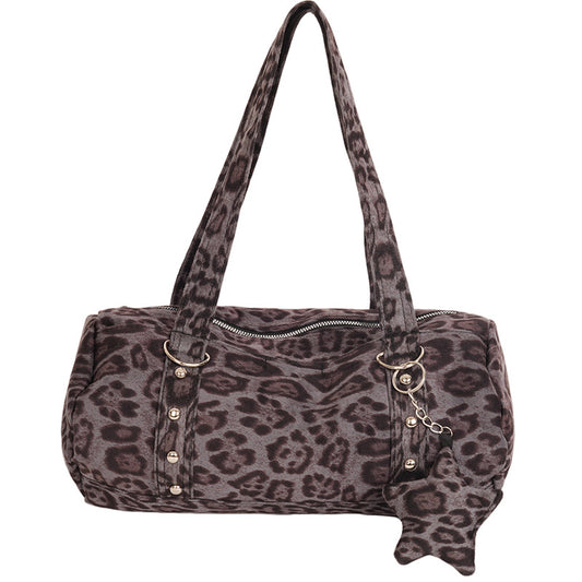 Y2K Pillow Tote Bag featuring a stylish leopard print design with camo accents and decorative keychain.