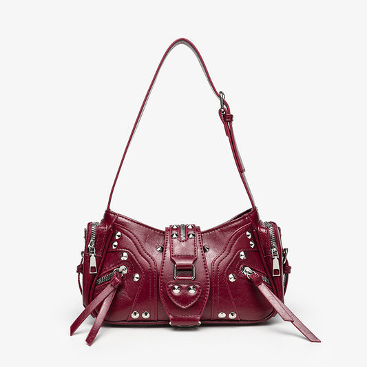AriaLuxe Retro Shoulder Crossbody Bag in burgundy with silver studs, zippers, and decorative ties. Stylish and edgy design.
