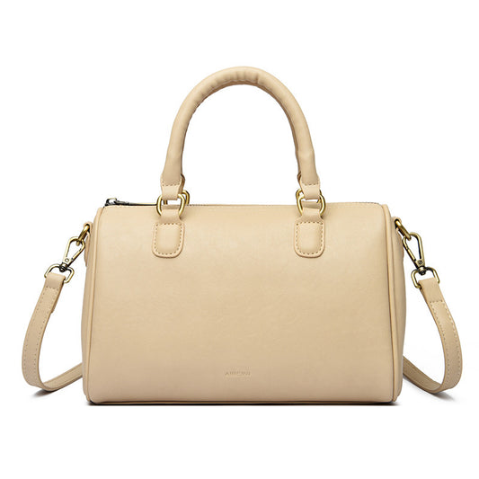 Roselle Cylindrical Shoulder Handbag in beige PU leather, featuring dual handles and a detachable shoulder strap. Dimensions: