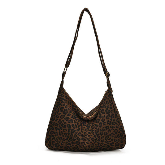 Large-capacity Sabi Leopard Crossbody bag by AriaLuxe featuring a stylish leopard print and a comfortable shoulder strap.